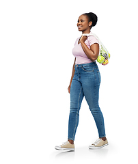 Image showing african woman with food in reusable string bag