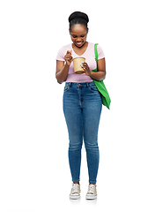 Image showing happy woman with reusable bag for food and wok