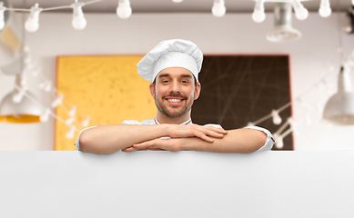 Image showing happy smiling male chef with big white board