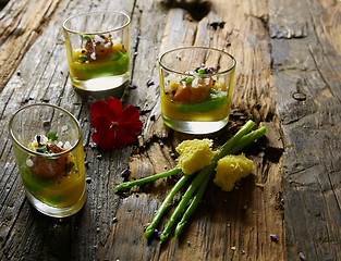 Image showing Snack from salmon and puree from avocado in a glass. Film effect