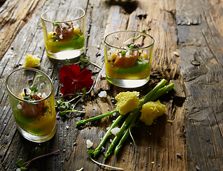 Image showing Snack from salmon and puree from avocado in a glass. Film effect