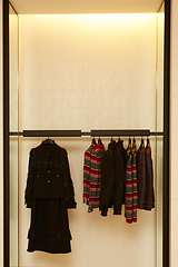 Image showing luxury and fashionable european different clothes shop