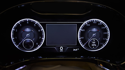 Image showing Modern car illuminated dashboard closeup