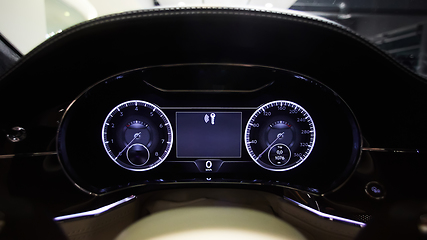 Image showing Modern car illuminated dashboard closeup