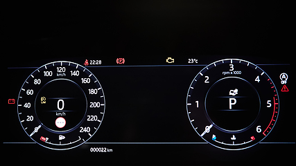 Image showing Modern car illuminated dashboard closeup