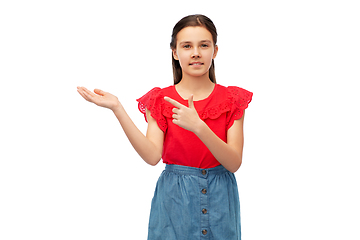 Image showing happy smiling girl holding something on her hand