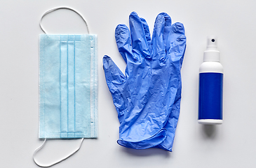 Image showing medical mask, gloves and hand sanitizer in spray