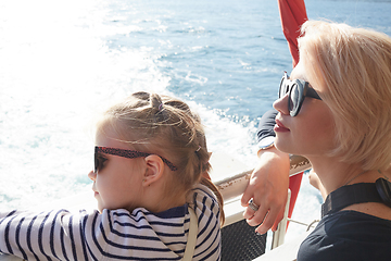 Image showing Summer. Portrait of mother with daughter having rest. Woman and girl child kid in sunglasses.