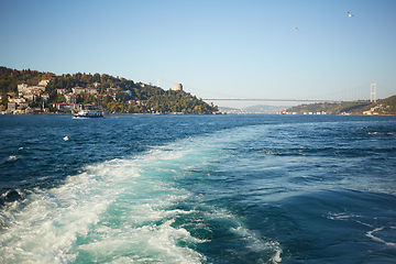 Image showing Trail on water surface behind of fast moving motor boat