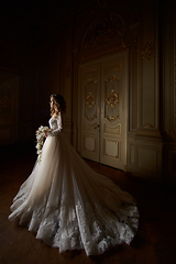 Image showing Beautiful bride in luxury baroque interior. Full-length portrait.