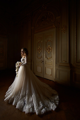 Image showing Beautiful bride in luxury baroque interior. Full-length portrait.