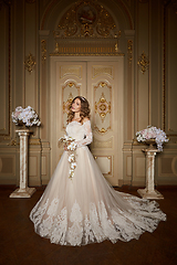 Image showing Beautiful bride in luxury baroque interior. Full-length portrait.