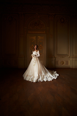 Image showing Beautiful bride in luxury baroque interior. Full-length portrait