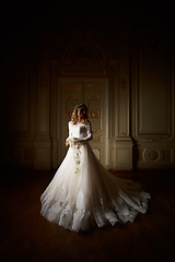 Image showing Beautiful bride in luxury baroque interior. Full-length portrait.