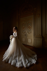 Image showing Beautiful bride in luxury baroque interior. Full-length portrait.