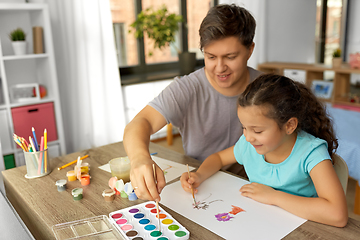 Image showing happy father with little daughter drawing at home