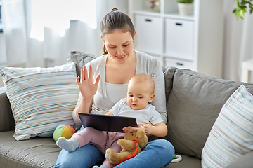 Image showing mother with baby having video call on tablet pc