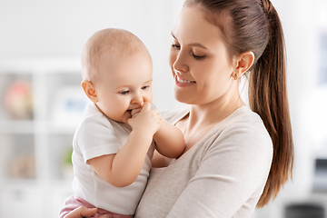 Image showing happy mother with little baby daughter at home