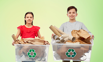 Image showing smiling girl and boy sorting paper waste