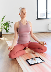 Image showing woman with tablet pc having online yoga class