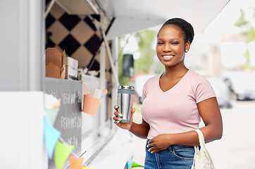 Image showing woman with tumbler and food in string bag