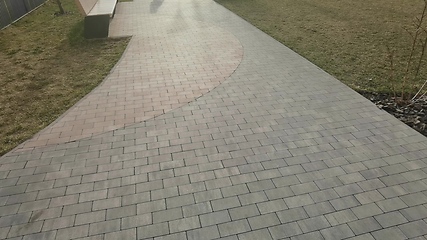 Image showing Little girl in roller skates at a park