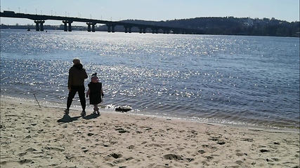 Image showing Child and Mother walking along the Shore, Dnepr River.