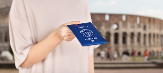 Image showing close up of woman holding immunity passport