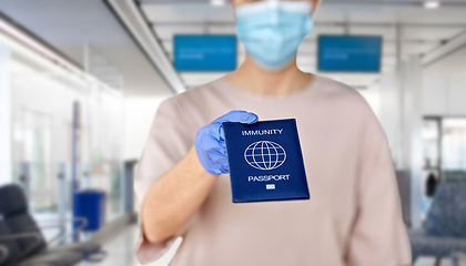Image showing close up of woman holding immunity passport