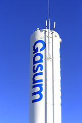 Image showing Gasum Gas Storage Tank With Company Logo against Blue Sky