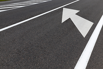 Image showing asphalted road with arrows