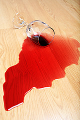 Image showing wine spill on hardwood floor