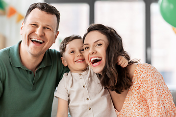 Image showing happy family with little son at birthday party