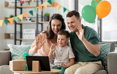 Image showing family with tablet pc has video call on birthday