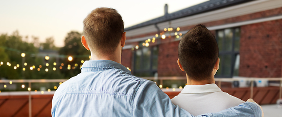 Image showing close up of happy male gay couple hugging