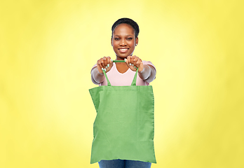 Image showing woman with reusable canvas bag for food shopping