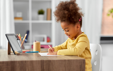 Image showing little girl drawing with pencils at home