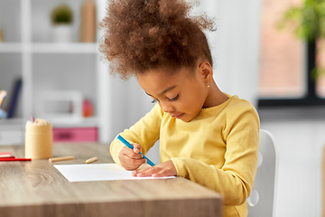 Image showing little girl with felt pen drawing picture at home