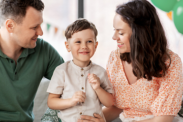 Image showing happy family with little son at birthday party