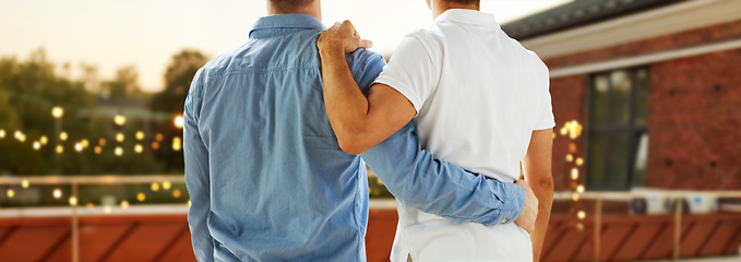 Image showing close up of happy male gay couple hugging