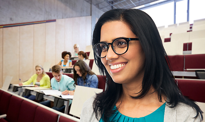 Image showing happy smiling young indian woman in glasses