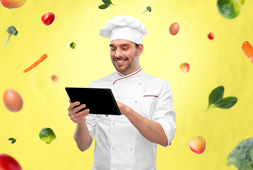 Image showing happy smiling male chef with tablet pc computer