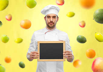 Image showing male chef showing chalkboard