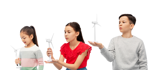 Image showing smiling children with toy wind turbine