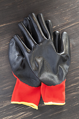 Image showing black and red protective gloves