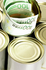 Image showing euro bills on a tin can