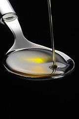 Image showing olive oil on a spoon