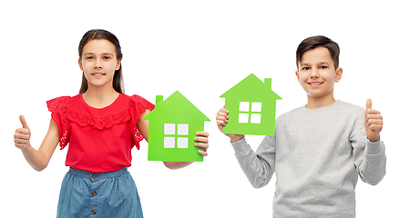 Image showing children with green house icons showing thumbs up