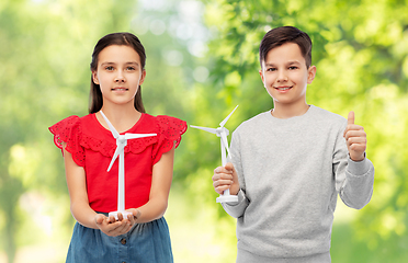 Image showing smiling children with toy wind turbine