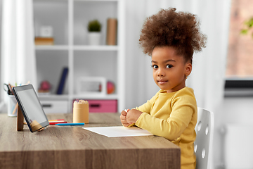 Image showing little girl drawing with pencils at home